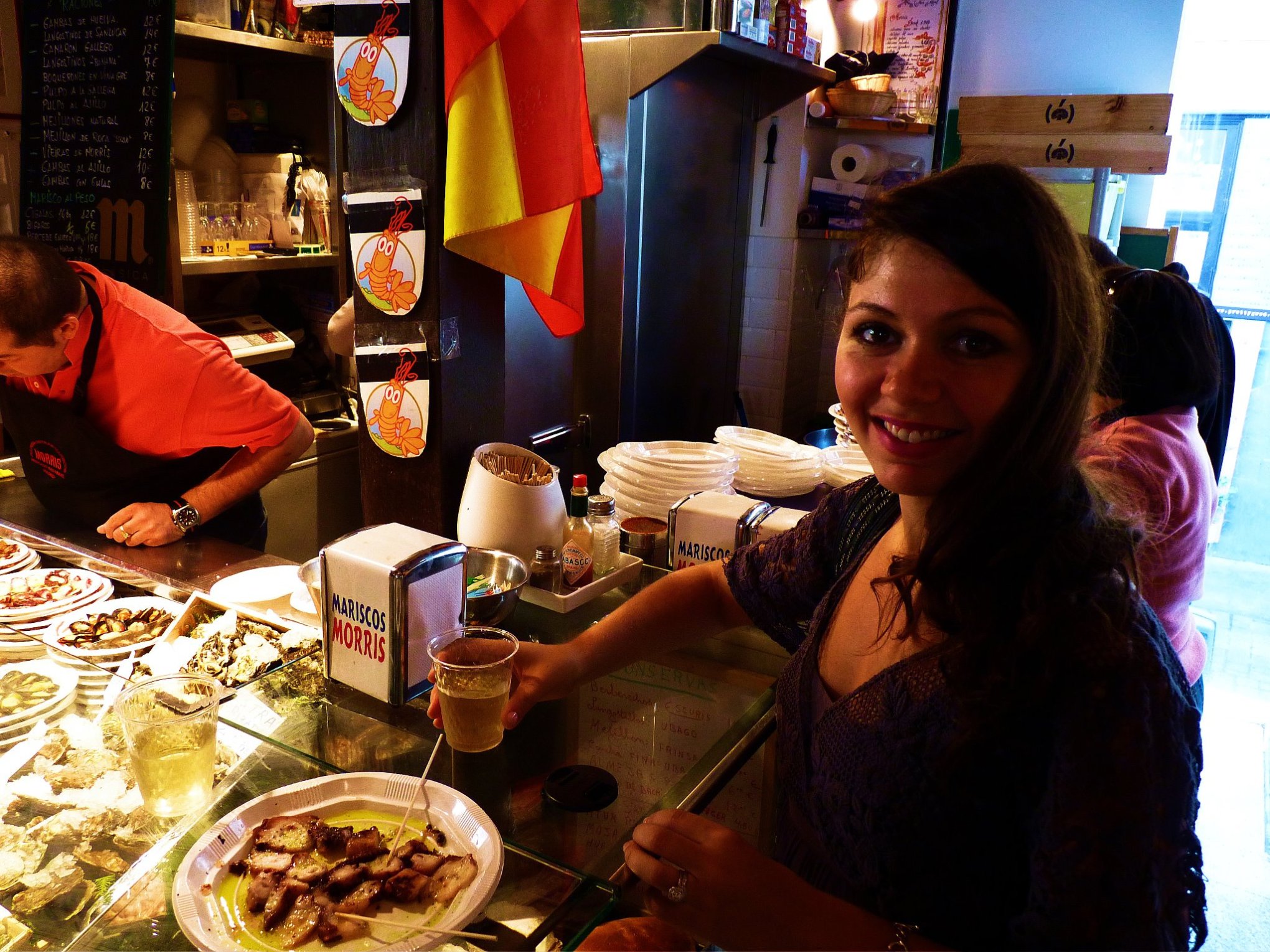 a woman cooking food in a restaurant
