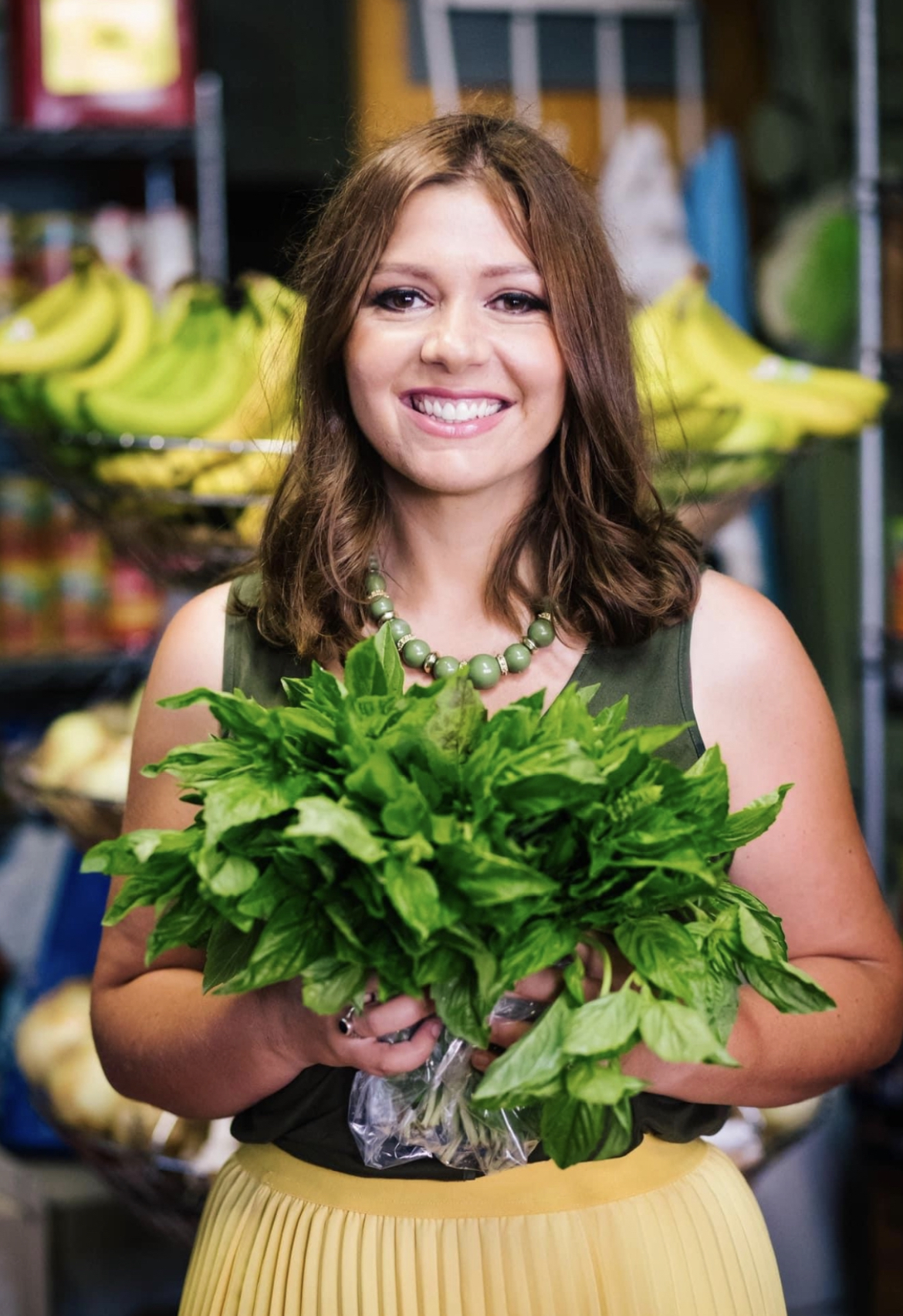 a woman holding a banana