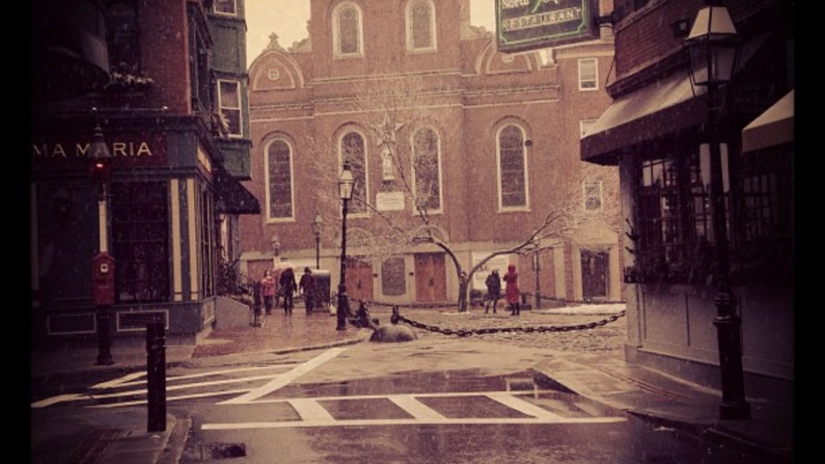 an old brick building on a street